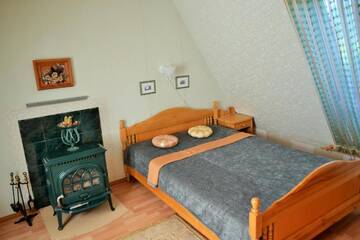 Фото номера Дом с 2 спальнями Дома для отпуска Ievnieki Guest House г. Cenkone 19