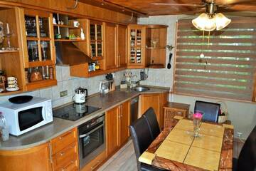 Фото номера Дом с 2 спальнями Дома для отпуска Ievnieki Guest House г. Cenkone 28