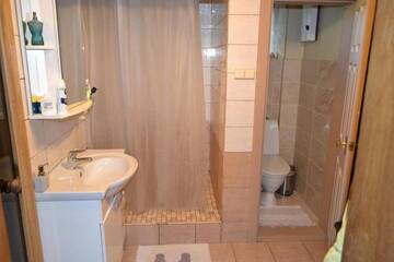 Фото номера Дом с 2 спальнями Дома для отпуска Ievnieki Guest House г. Cenkone 29